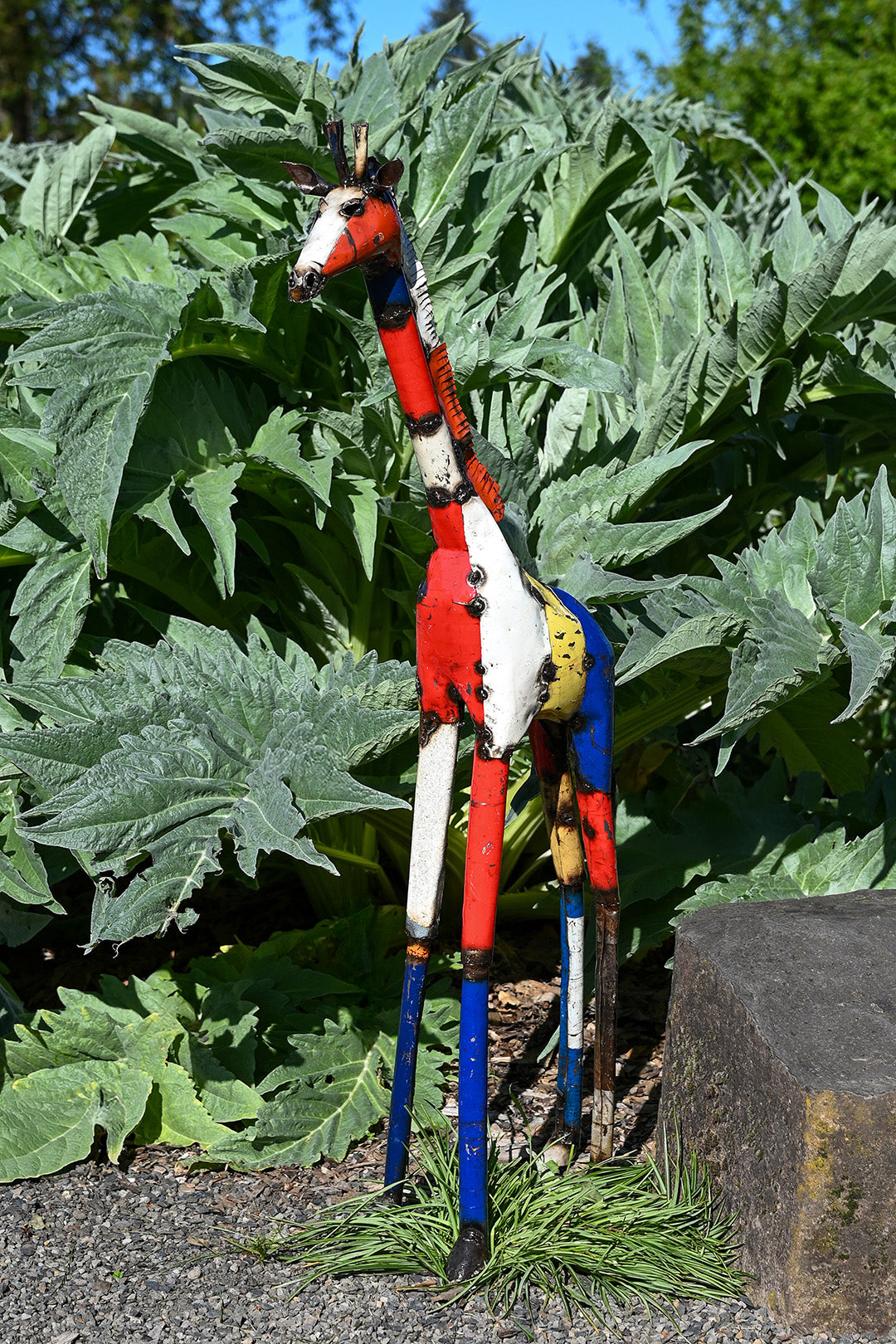 Colorful Giraffe Oil Drum Sculptures