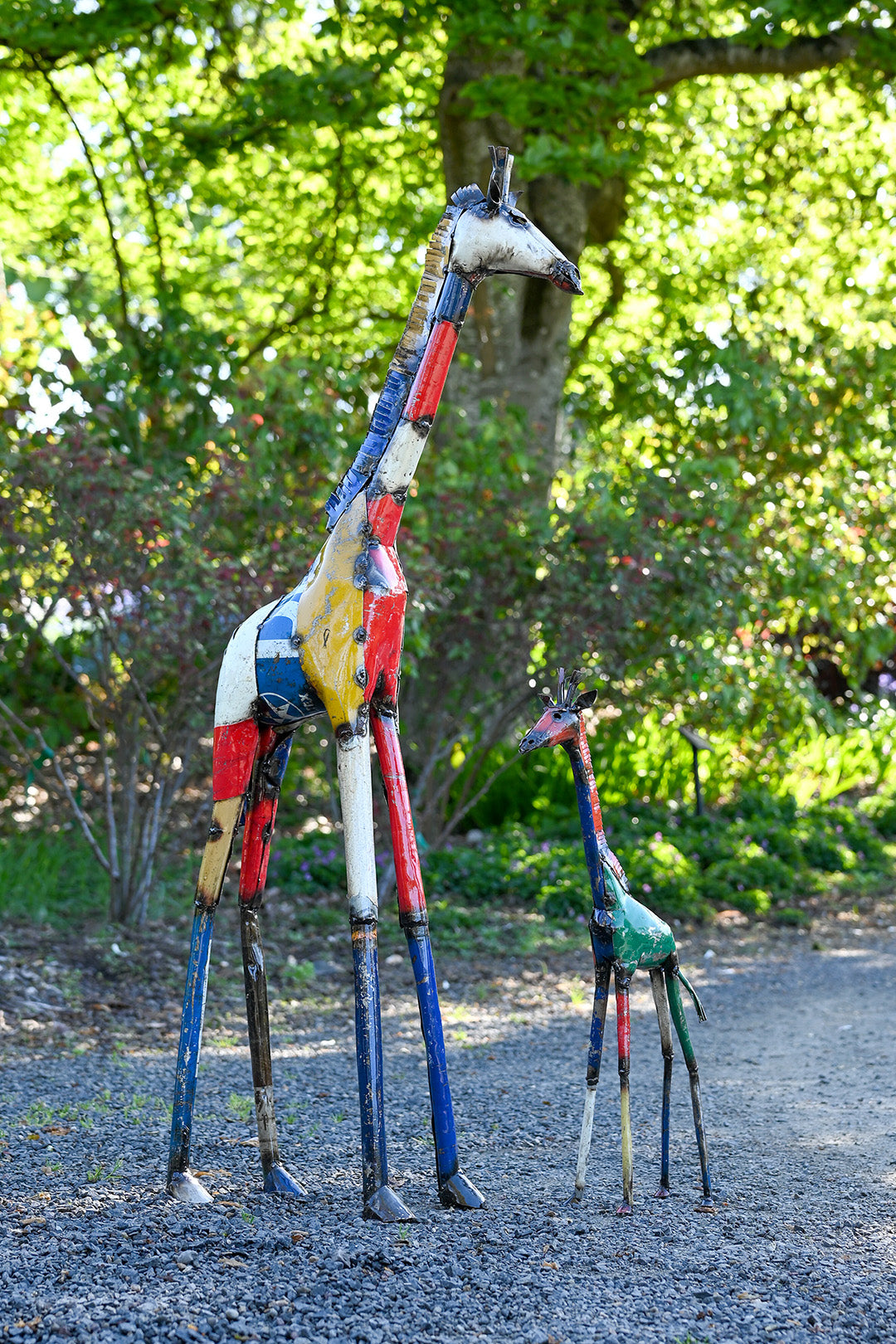 Colorful Giraffe Oil Drum Sculptures