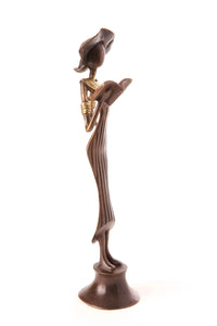 Noble by Nature Walking Reader Bronze Sculpture